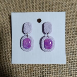 Lavender polymer clay earrings with a marbled cabochon detail