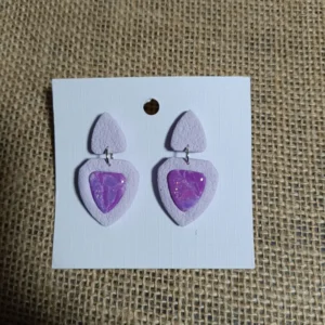 Handmade lavender earrings with marbled cabochon design.